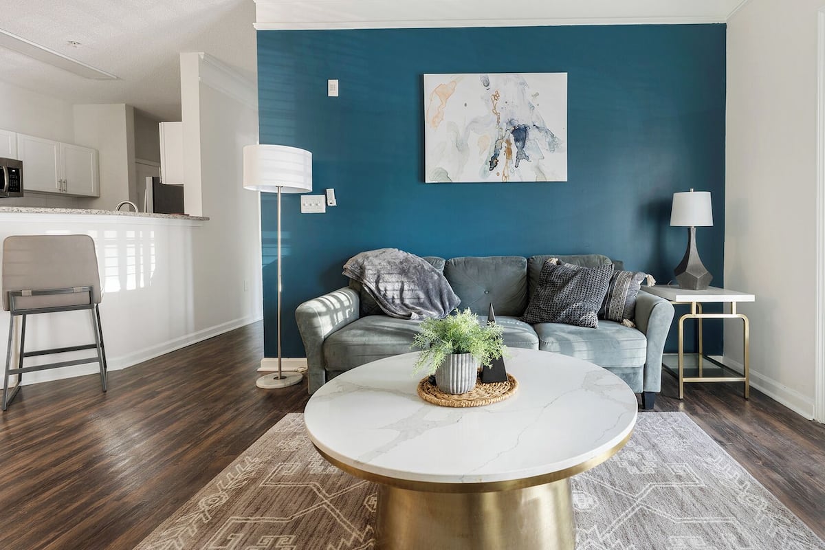 Apartment, 1 Bedroom | Living area | 50-inch Smart TV with digital channels