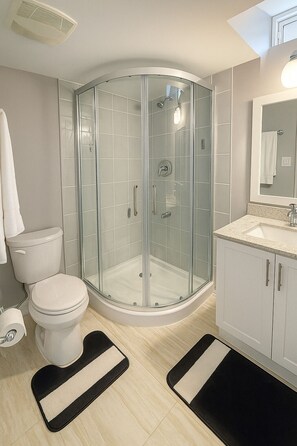 Shower, hair dryer, towels, soap