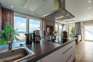 Fridge, microwave, dishwasher, coffee/tea maker