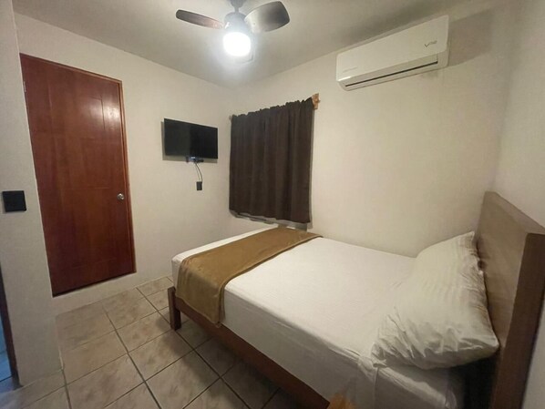 Chambre Ville double ou avec lits jumeaux | Literie de qualité, couette en duvet, lit avec matelas à plateau-coussin