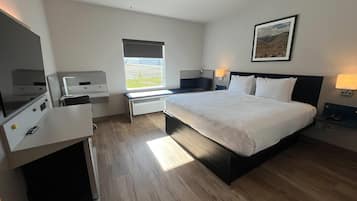 Rideaux occultants, fer et planche à repasser, lits bébé (en supplément)