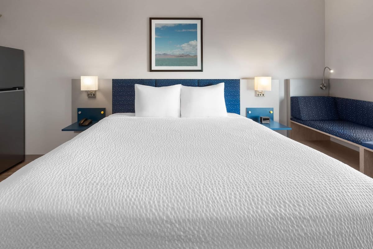 Laptop workspace, blackout drapes, iron/ironing board, rollaway beds