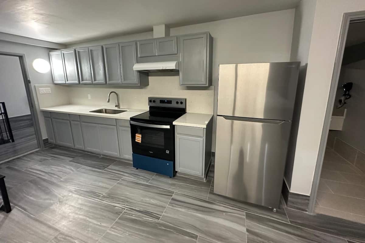 Family Suite, Multiple Beds, Non Smoking | Private kitchen