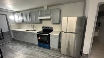 Family Suite, Multiple Beds, Non Smoking | Private kitchen | Full-size fridge, microwave, coffee grinder, paper towels