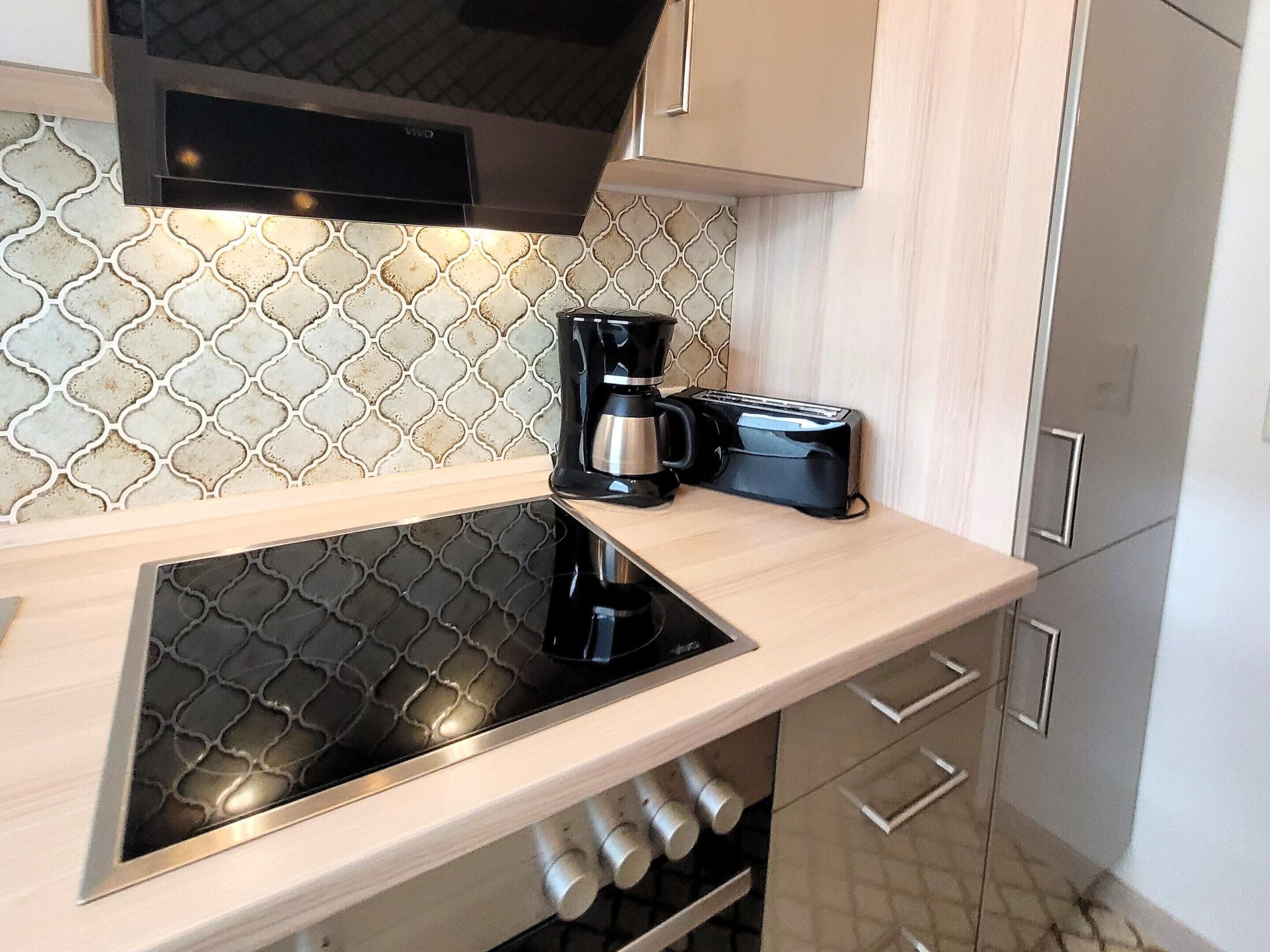 Appartement | Privékeuken | Kookgerei, borden en bestek