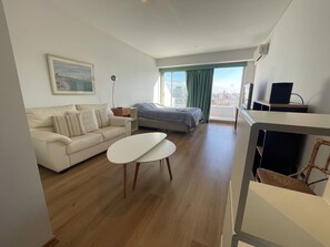 Deluxe Studio, City View | Living area - Ayres Obelisco Suites (Buenos Aires)