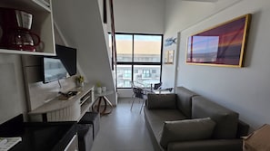 Appartement Duplex Confort, vue cour intérieure | Coin séjour