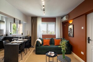 Comfort Apartment, 2 Bedrooms, Balcony | Living area | 43-inch Smart TV with digital channels, Netflix, streaming services - Artful & Light-Filled 2BR on Calea Victoriei - Prime Central Spot (Bucharest)