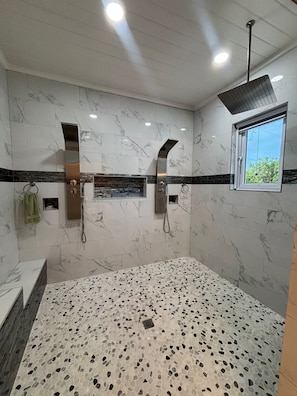 Jetted bath, towels, soap, toilet paper