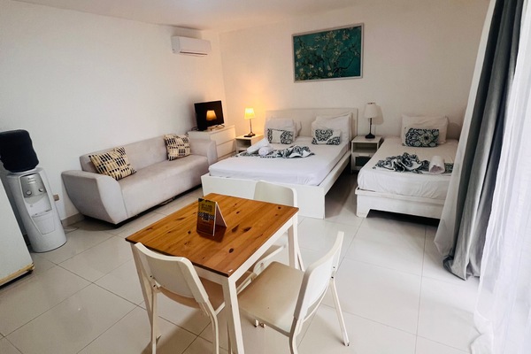 Studio, Balcony, Pool View | In-room safe, WiFi (free), bed sheets