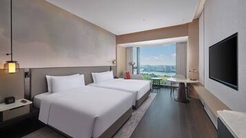 Executive Room, 2 Twin Beds, River View | Down comforters, minibar, desk, iron/ironing board