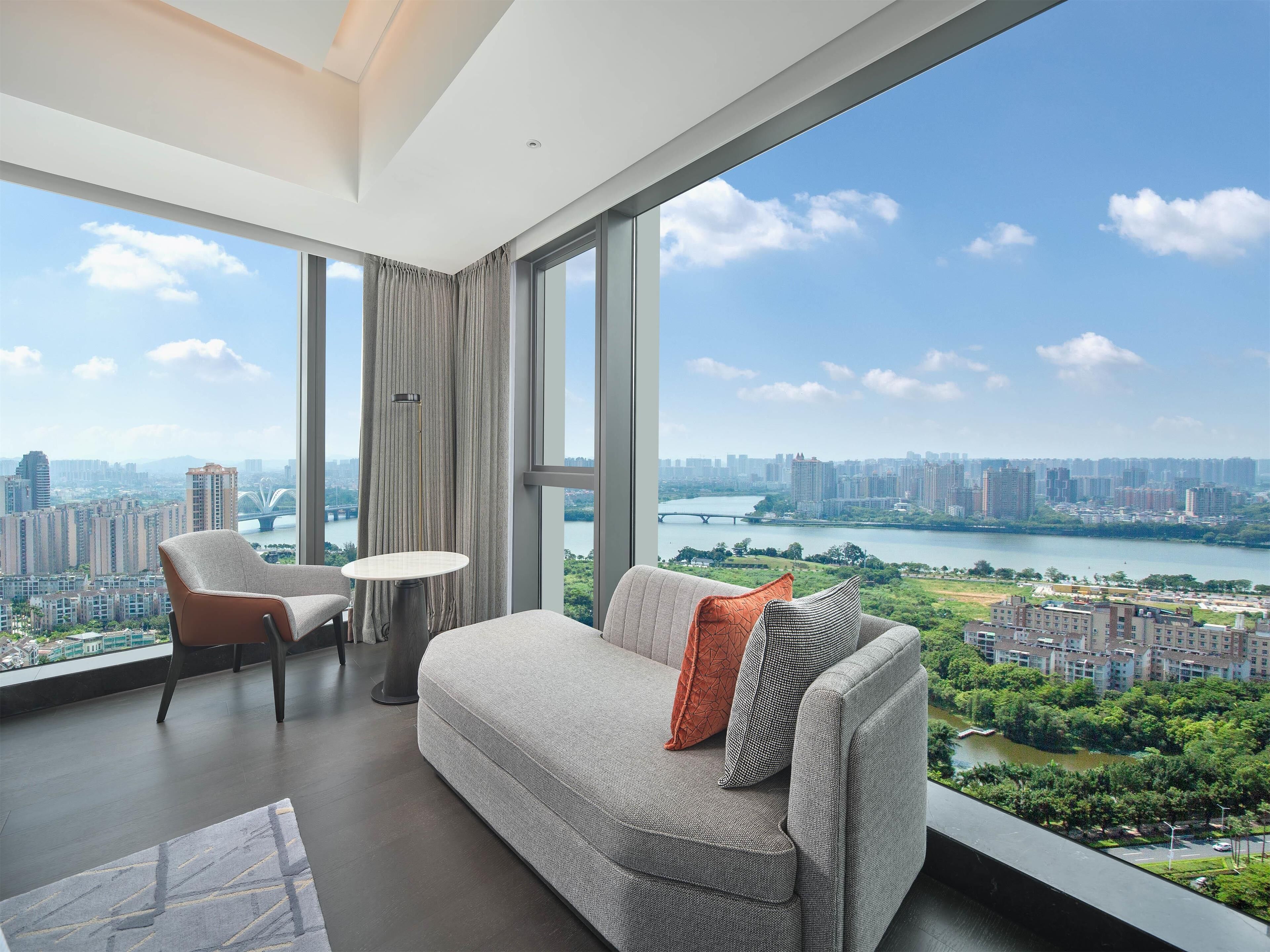 Premium Suite, 1 King Bed | Living area | 55-inch LCD TV with satellite channels