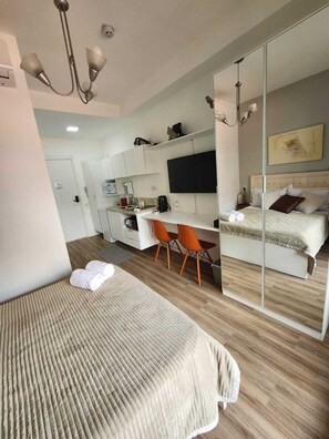 1 habitación, tabla de planchar con plancha, wifi y ropa de cama 