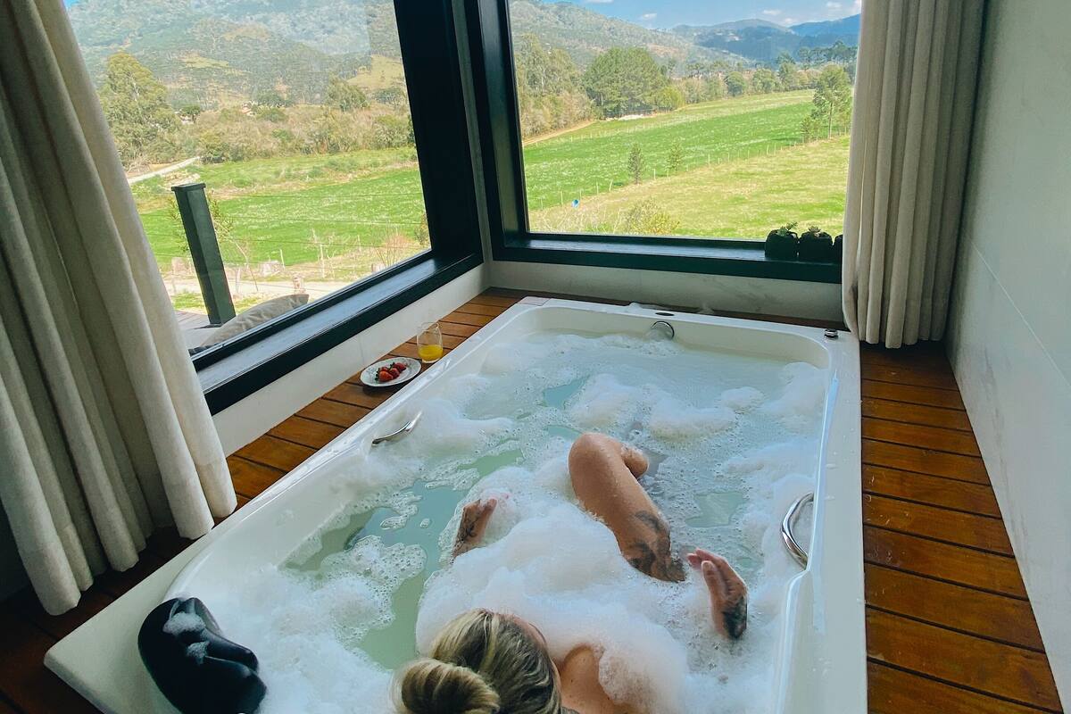 Honeymoon Cabin | Bathroom | Separate tub and shower, jetted tub, hair dryer, bathrobes