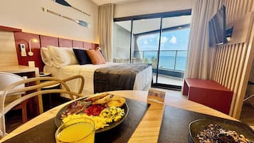 Deluxe Studio, Lanai, Sea View | In-room safe, desk, laptop workspace, blackout drapes