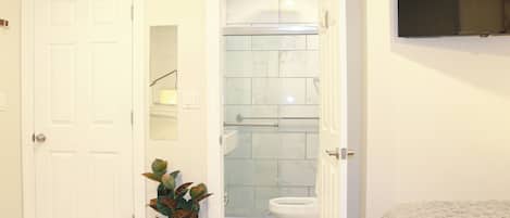 Shower, hair dryer, towels, soap