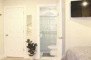 Shower, hair dryer, towels, soap