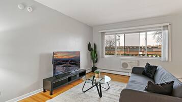 Standard Apartment, 1 Bedroom, Non Smoking, Pets allowed | Living area | 55-inch TV with digital channels, streaming services