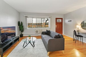 Standard Apartment, 1 Bedroom, Non Smoking, Pets Allowed | Living area | 55-inch TV with digital channels, streaming services