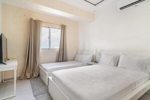 2 bedrooms, in-room safe, iron/ironing board, travel cot