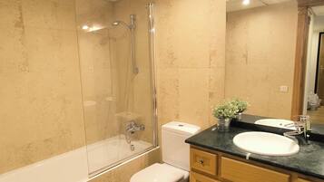 Hair dryer, bidet, towels, soap