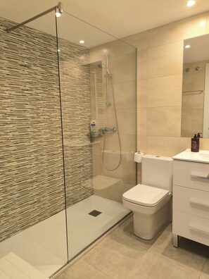 Hair dryer, towels, soap, shampoo