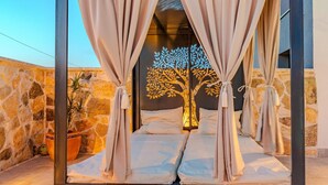 A bed with beige curtains and a tree mural on the wall behind it. - Amazing home in Zagrad (Zagrad)