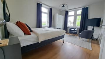 2 habitaciones, tabla de planchar con plancha, wifi y ropa de cama