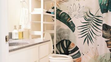Hair dryer, towels, soap, shampoo