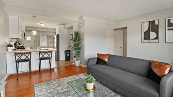 Comfort Apartment, 1 Bedroom | Living area | 55-inch TV with digital channels, streaming services