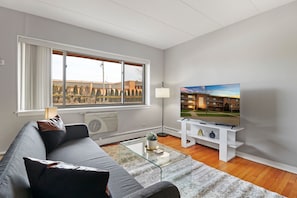 Apartamento Confort, 1 habitación | Zona de estar