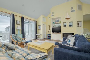 TV, fireplace - 5593-Craven Haven, a 4BR, 3.5BA home in Nags Head—sleeps up to 10 guests. (Nags Head)
