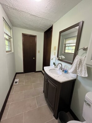 Hair dryer, towels, soap, toilet paper