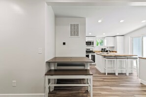 Coffee/tea maker, fridge, microwave, oven