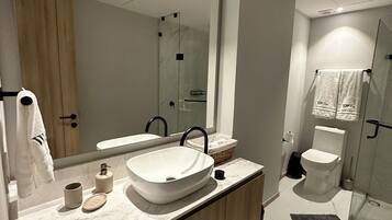 Hair dryer, towels, soap, toilet paper