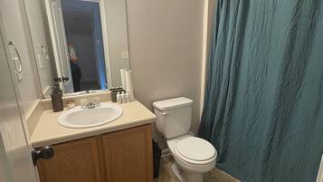 Hair dryer, towels, soap, toilet paper