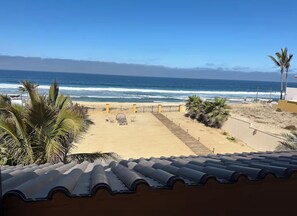 On the beach, sun-loungers, beach towels