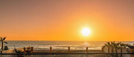 On the beach, sun loungers, beach towels