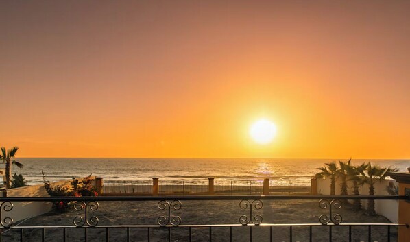 On the beach, sun loungers, beach towels