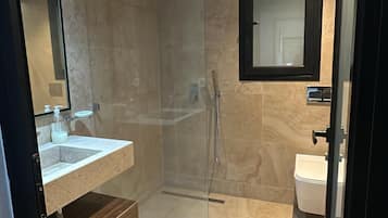 Jetted bath, hair dryer, towels, soap