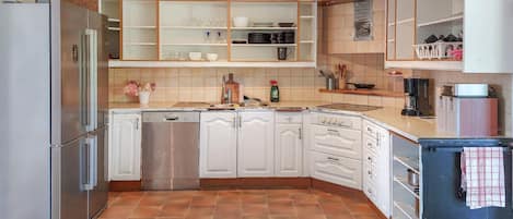 Fridge, stovetop, coffee/tea maker, cookware/dishes/utensils