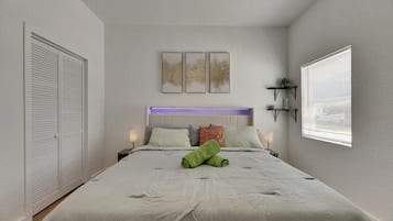 1 bedroom, desk, iron/ironing board, travel crib