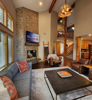 Smart TV, fireplace, foosball, books