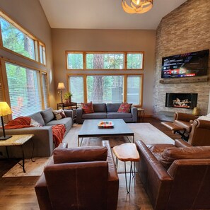 Smart TV, fireplace, foosball, books