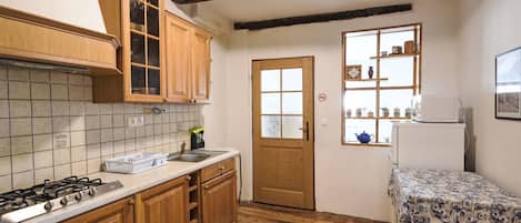 Fridge, microwave, cookware/dishes/utensils