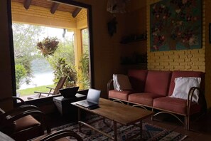 Living area - Charming 4-bedroom country house in Lago Calima with WiFi and lake view (Restrepo)