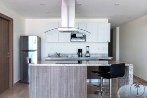 Microwave, coffee/tea maker, cookware/dishes/utensils