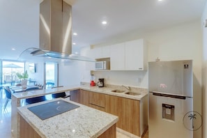 Fridge, microwave, cookware/dishes/utensils
