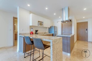 Fridge, microwave, cookware/dishes/utensils