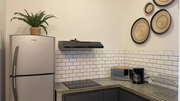 Fridge, microwave, cookware/dishes/utensils